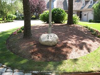 House number etched in natural field stone